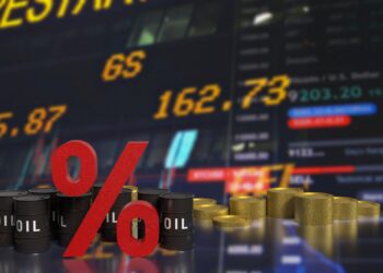 Petrol varilleri ve altın yığınlarının önünde büyük kırmızı yüzde işareti