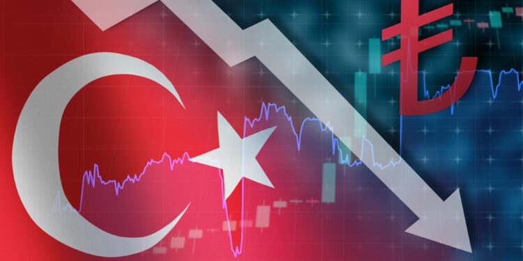 Türkiye haritası ve Türk lirası sembolü üzerinde düşüşü gösteren grafik.